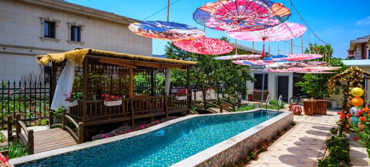 花筑·悦汐汇温泉民宿(金石滩快乐海岸店)图片