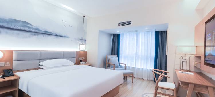 云孚里酒店(自贡彩灯公园梵华购物广场店)图片