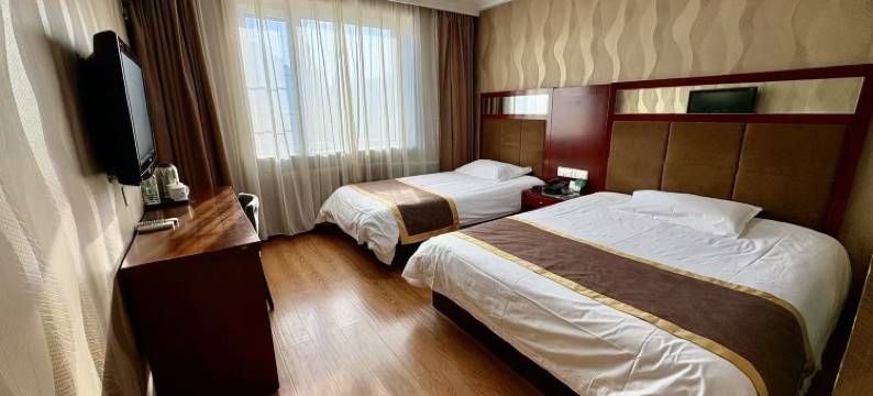 春天连锁宾馆(哈尔滨哈东站地铁站工程学院店)图片