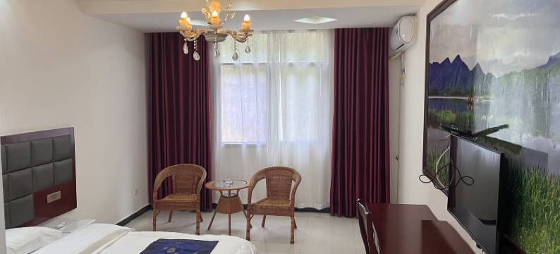 神农架九福商务酒店(大九湖坪阡古镇店)图片