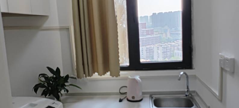 郑州有间客栈(正弘城数码公寓店)图片