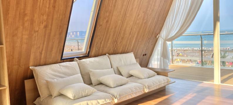 青岛金沙滩沐海度假民宿(凤凰之声大剧院店)图片