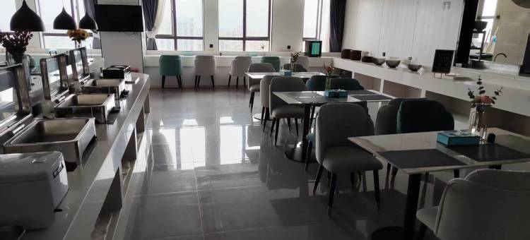 鹰潭漫岛酒店(凯翔新天地购物广场店)图片