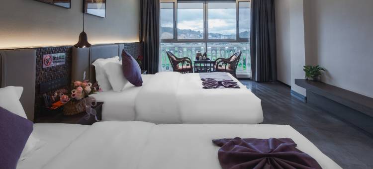 岩佤茶空间智能酒店(勐巴拉国际度假区沙河小镇店)图片