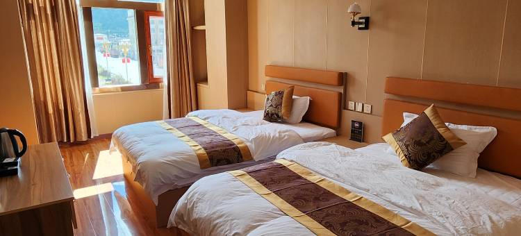 吉隆日吾边八商务大酒店图片