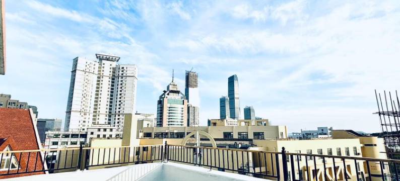 邻海畔公寓(万象城五四广场地铁站店)图片