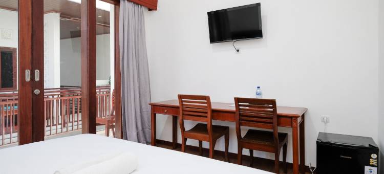 Urbanview Hotel Arta Guna Casa图片