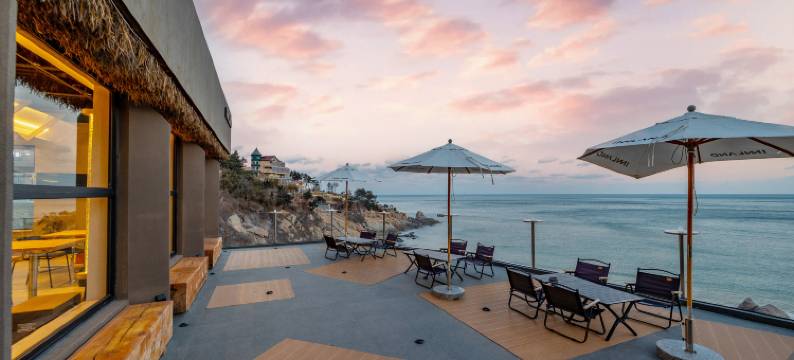 青岛印澜一宿·悬崖海景民宿(崂山风景区泉心河沙滩店)图片