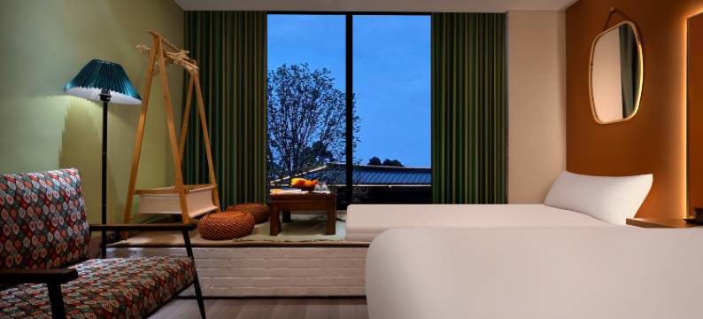 芊芊芒果树酒店(乐山大佛东大街美食街店)图片