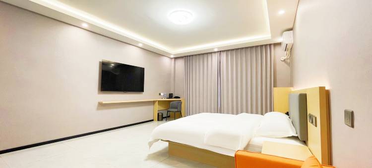 名成商务宾馆(汽开区二实验学校一汽店)图片