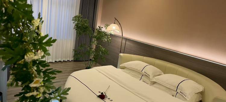 镇康明都商务酒店图片