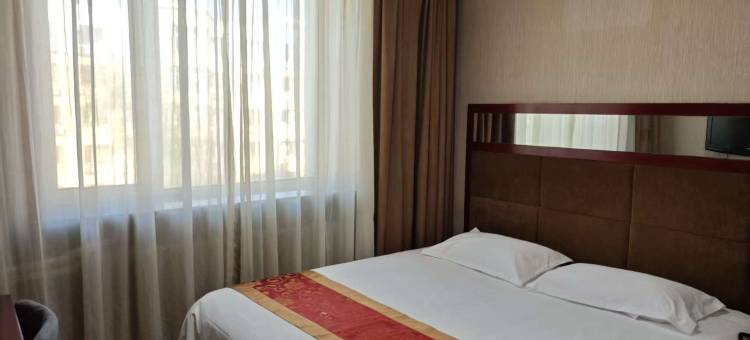 春天连锁宾馆(哈尔滨哈东站地铁站工程学院店)图片