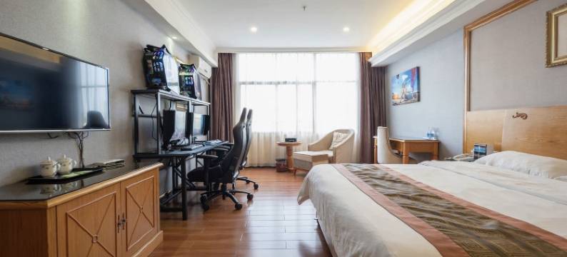 亚信电竞酒店(深圳坪地宜城PARK沃尔玛店)图片