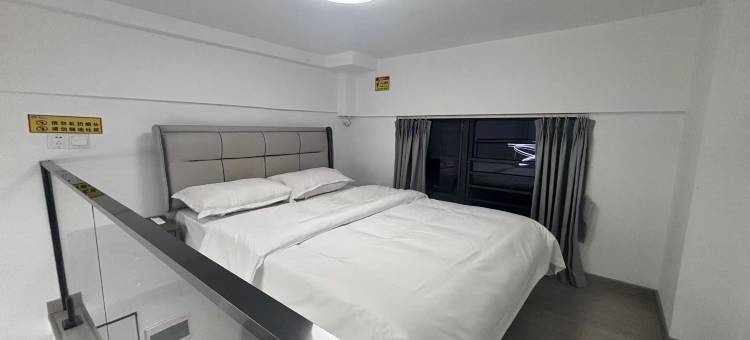 沐风•轻奢影院loft公寓(力高雍湖国际鱼尾洲地铁站店)图片