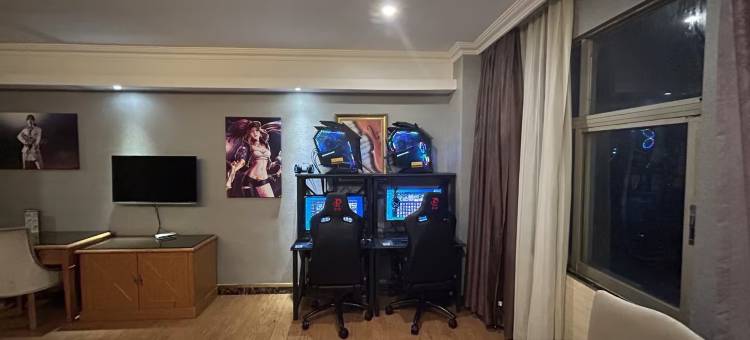 亚信电竞酒店(深圳坪地宜城PARK沃尔玛店)图片