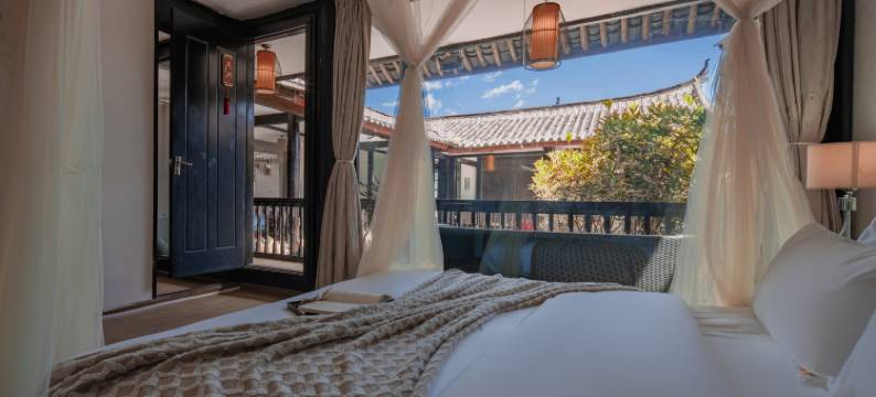 屿白归云艺术家民宿【束河古镇店】图片