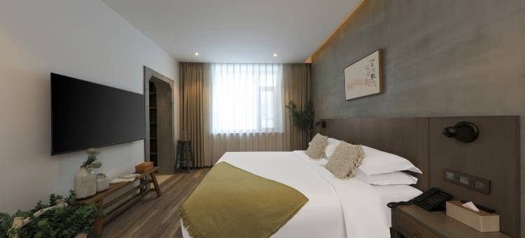 隐逸酒店(东环不夜城中东大市场店)图片