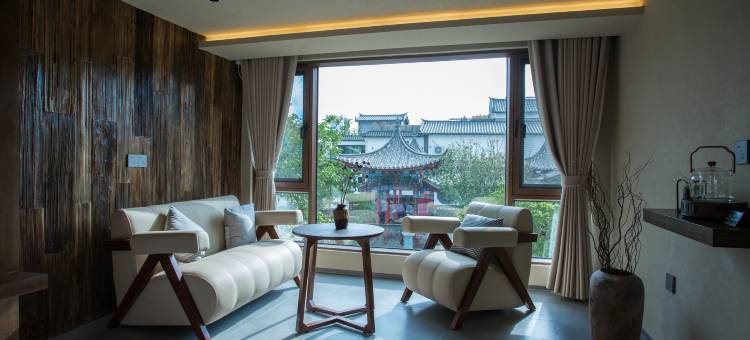 暖阳里丨Designer丶落日夕阳丨高定设计师度假民宿(古城店)图片