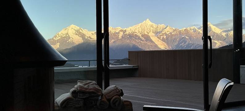 德钦梅里观云伴山·雾浓顶图片