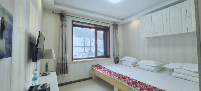 雪乡明哥酒店图片