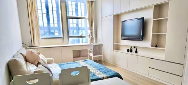 宏斌自助公寓(威海高铁站店)图片