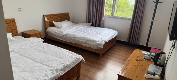 姚记石锅鱼庄民宿图片