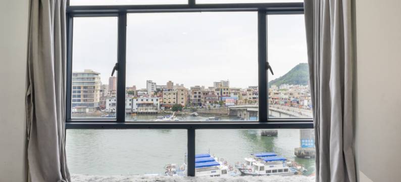 双月湾再遇时尚公寓(情人堤店)图片