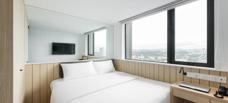 广民酒店孟沙南城(Komune Living)图片