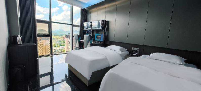 KM酒店(绥阳林达美食街店)图片