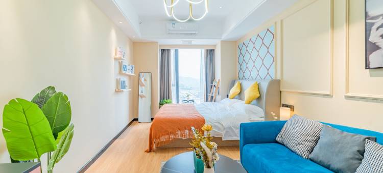 栖牛XINIU·投影自助公寓(乐山万达广场店)图片