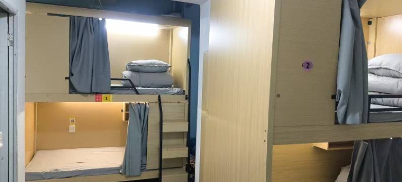 起源青年公寓(北仑银泰店)图片