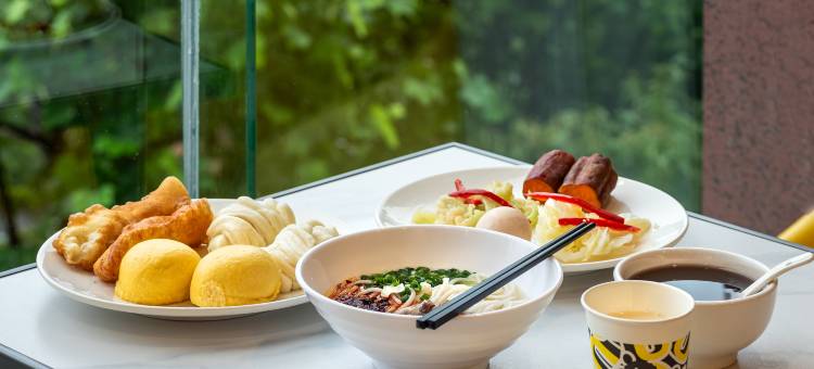 IU酒店(盘州东湖公园红果小广场店)图片