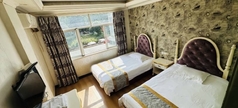 鼎豪宾馆(逸盛路地铁站店)图片