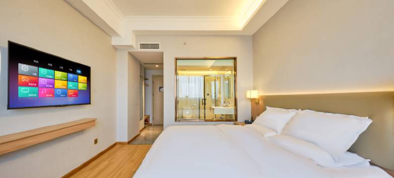 艺龙海雅酒店(许昌胖东来时代广场曹魏古城店)图片