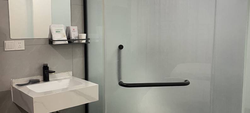 百佳宾馆(玉门站商业步行街店)图片