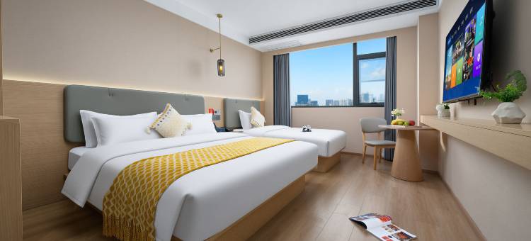 艺龙海雅酒店(许昌胖东来时代广场曹魏古城店)图片