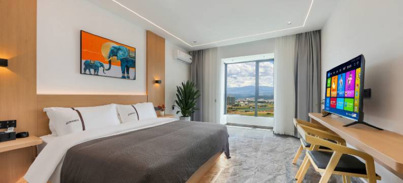 西双版纳景洪逸格智能酒店(曼听公园店)图片