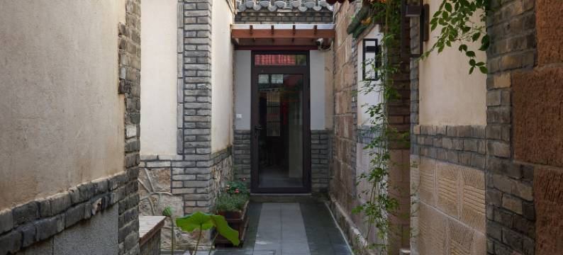 两棵冬青海岸庭院民宿(烟台山景区店)图片
