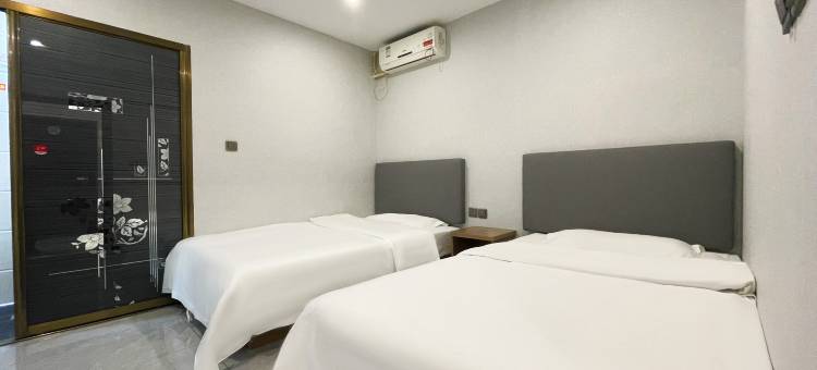 名成商务宾馆(汽开区二实验学校一汽店)图片