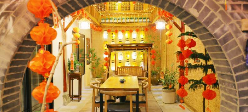 阆中步月居孔雀主题民宿图片