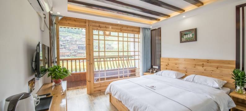 谷里全景度假美宿(西江千户苗寨一号风雨桥店)图片