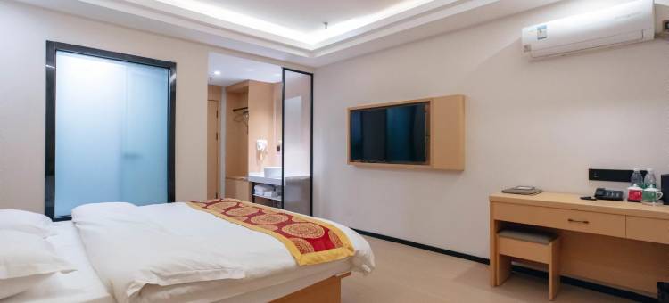 格林联盟酒店(塔城闻琴路左岸阳光店)图片