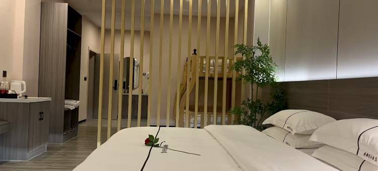 镇康明都商务酒店图片