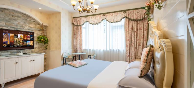 友佳主题酒店(彭州高铁站龙兴寺店)图片