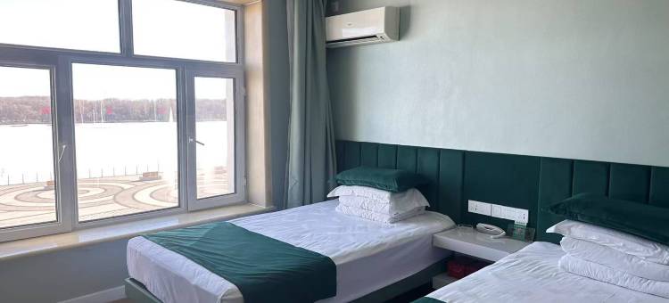 饶河华如商务宾馆(沿江花园小区店)图片