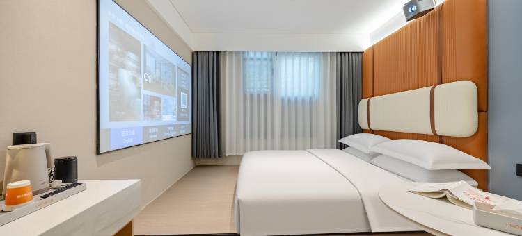 城小橙·AI智慧民宿(咸宁火车站店)图片