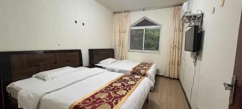 合家套房民宿(信阳鸡公山风景区店)图片