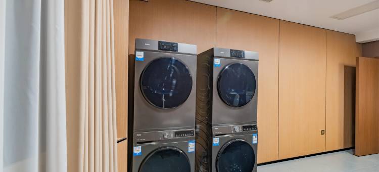 良港轻居酒店(广安思源广场吾悦广场店)图片