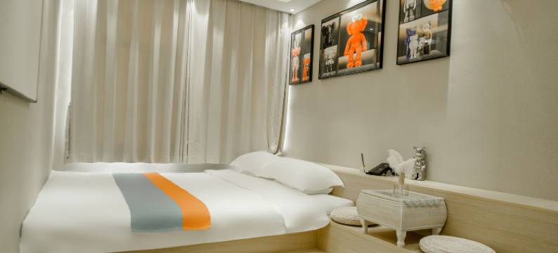 慕鸣主题酒店(庆云石佛大街红磡龙著店)图片