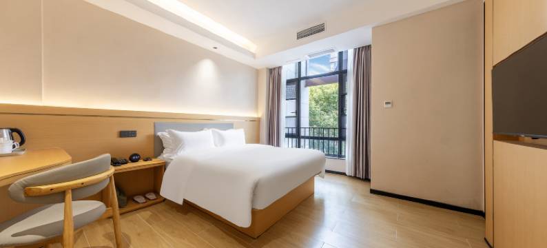 金海伦酒店(崇州高铁站沃尔玛店)图片